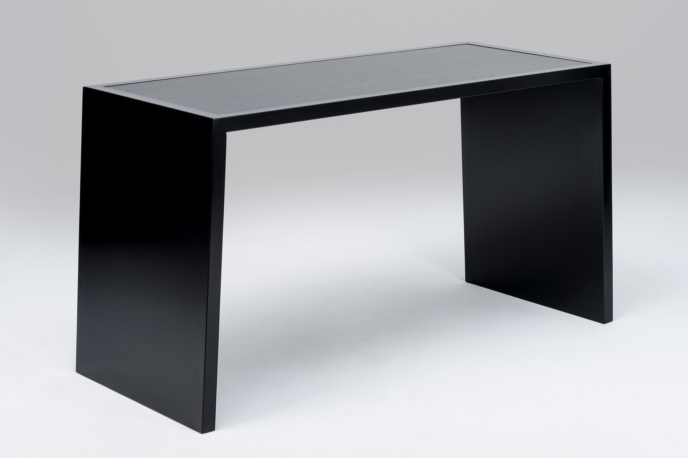 Instantly the hero of this room is the black modern minimalist designer table by Australian designer francocrea