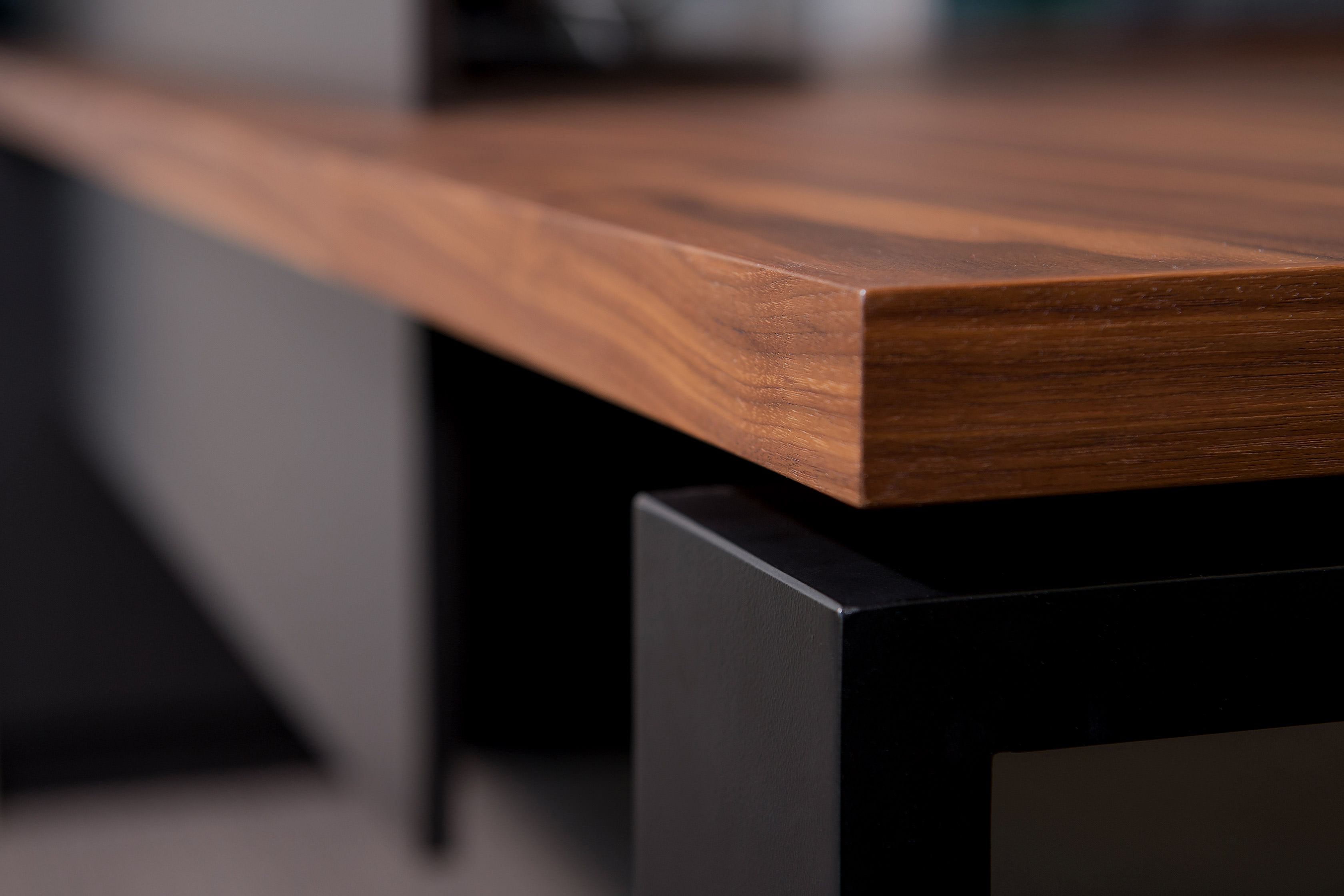 A superb corner detail of the solid walnut desk by Australian designer FrancoCrea catches your eye as you move through the office