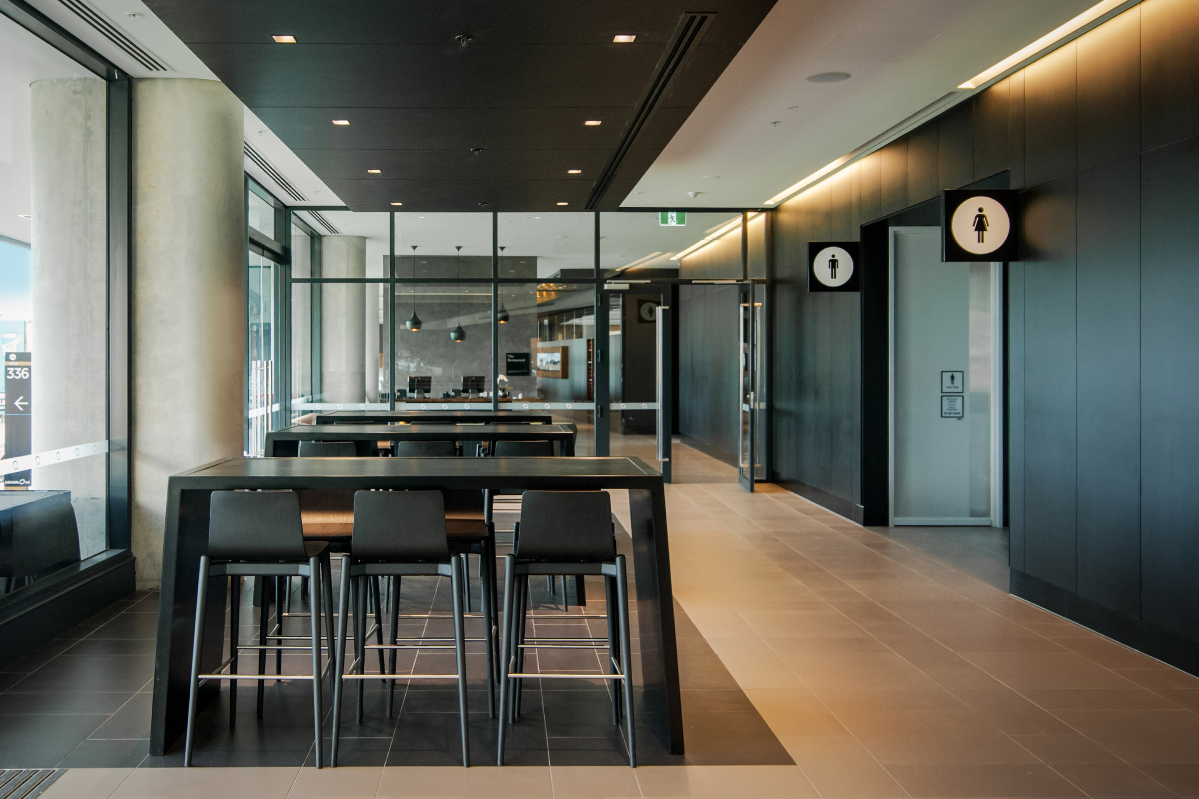 Rich textures and colours collide in this corporate event space at Adelaide Oval complemented by Australian designer FrancoCrea's bespoke designer tables