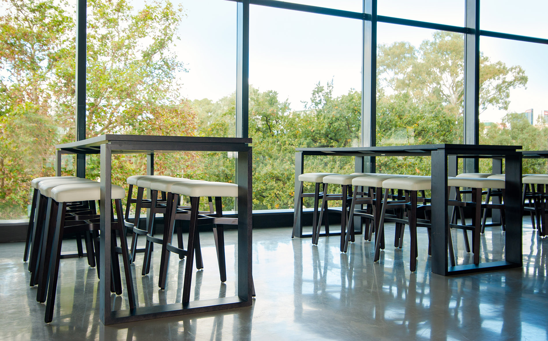 beautiful shadows fill this corporate room at the Adelaide Oval as the light splinters of the designer tables by Australian designer FrancoCRea