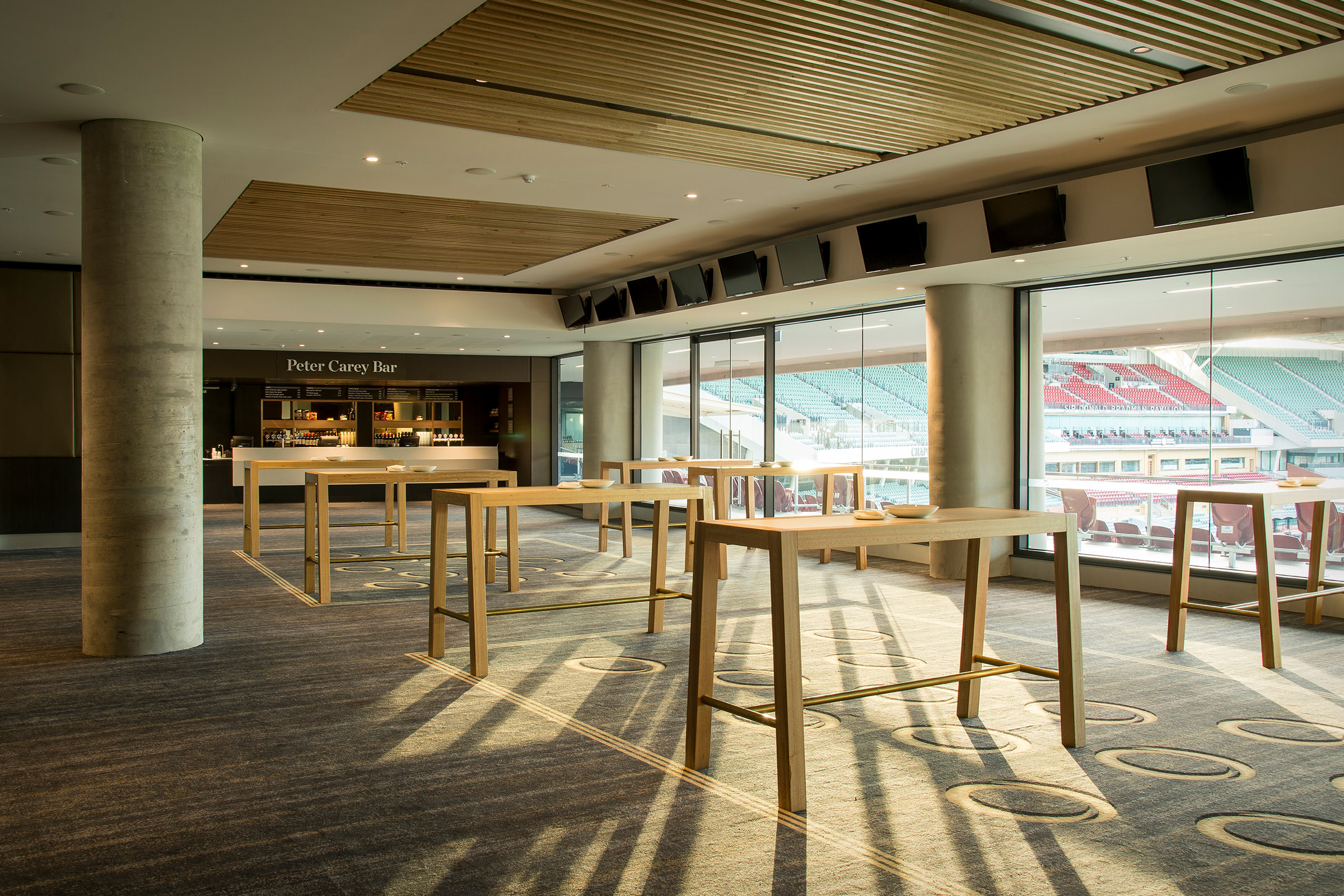 beautiful shadows fill this corporate room at the Adelaide Oval as the light splinters of the designer tables by Australian designer FrancoCRea