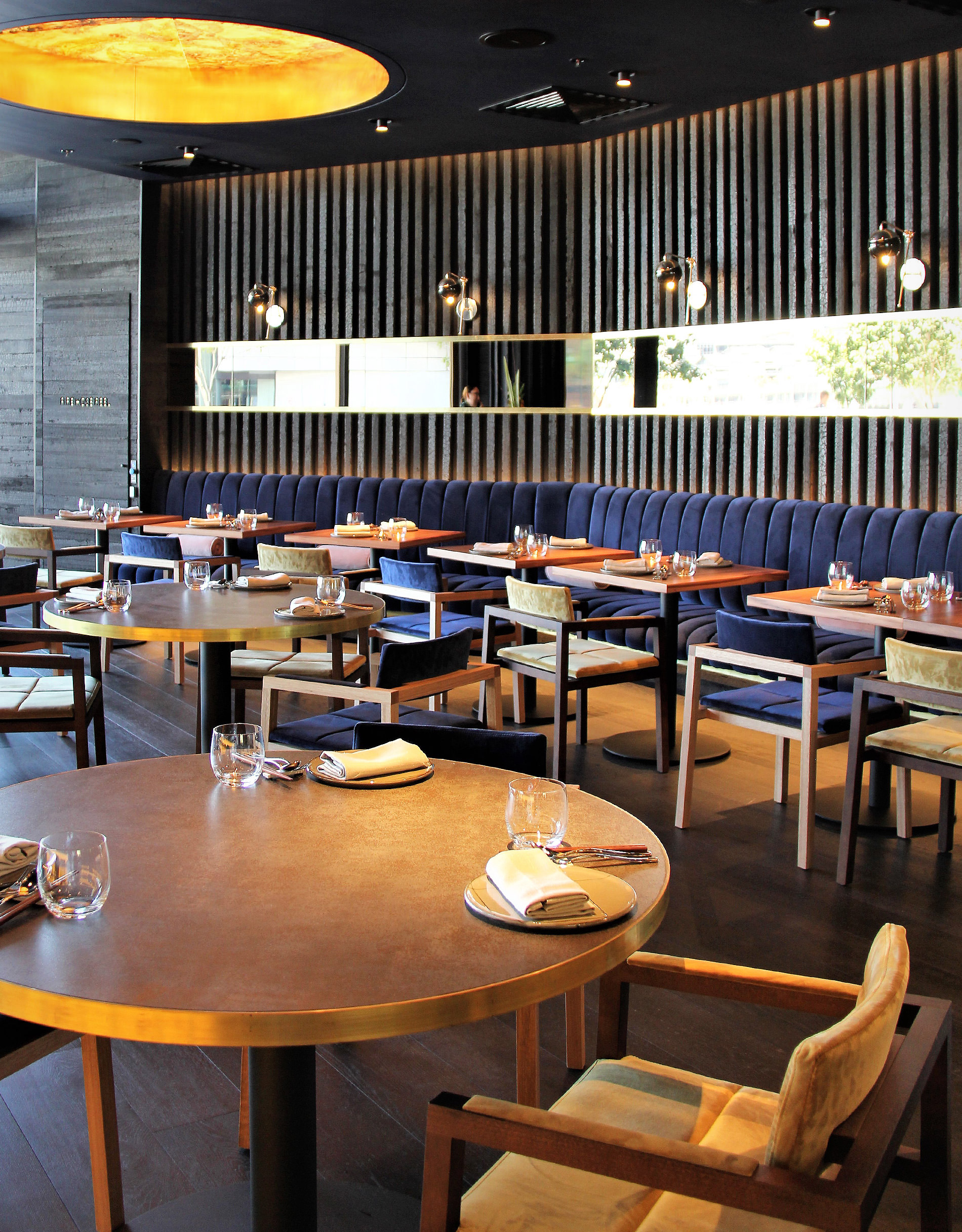 a night time treat to dine in this stunning Japanese restaurant and relax on the velvet and solid walnut wood dining chairs by Australian designer francocrea