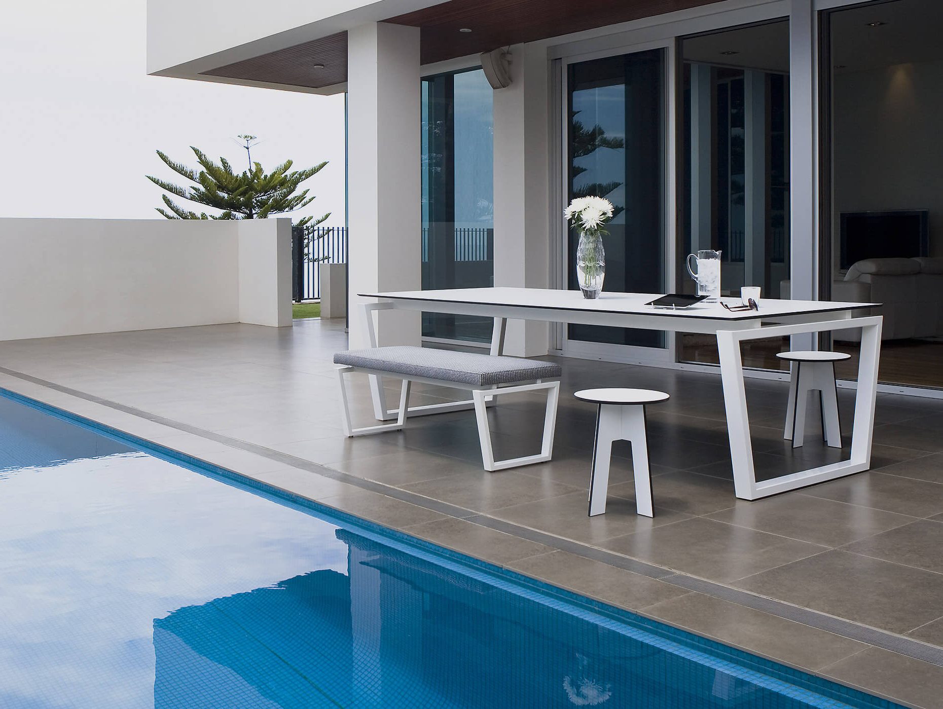 Stunning place to rest and spend time around the designer outdoor table by Australian designer francocrea in this Adelaide home