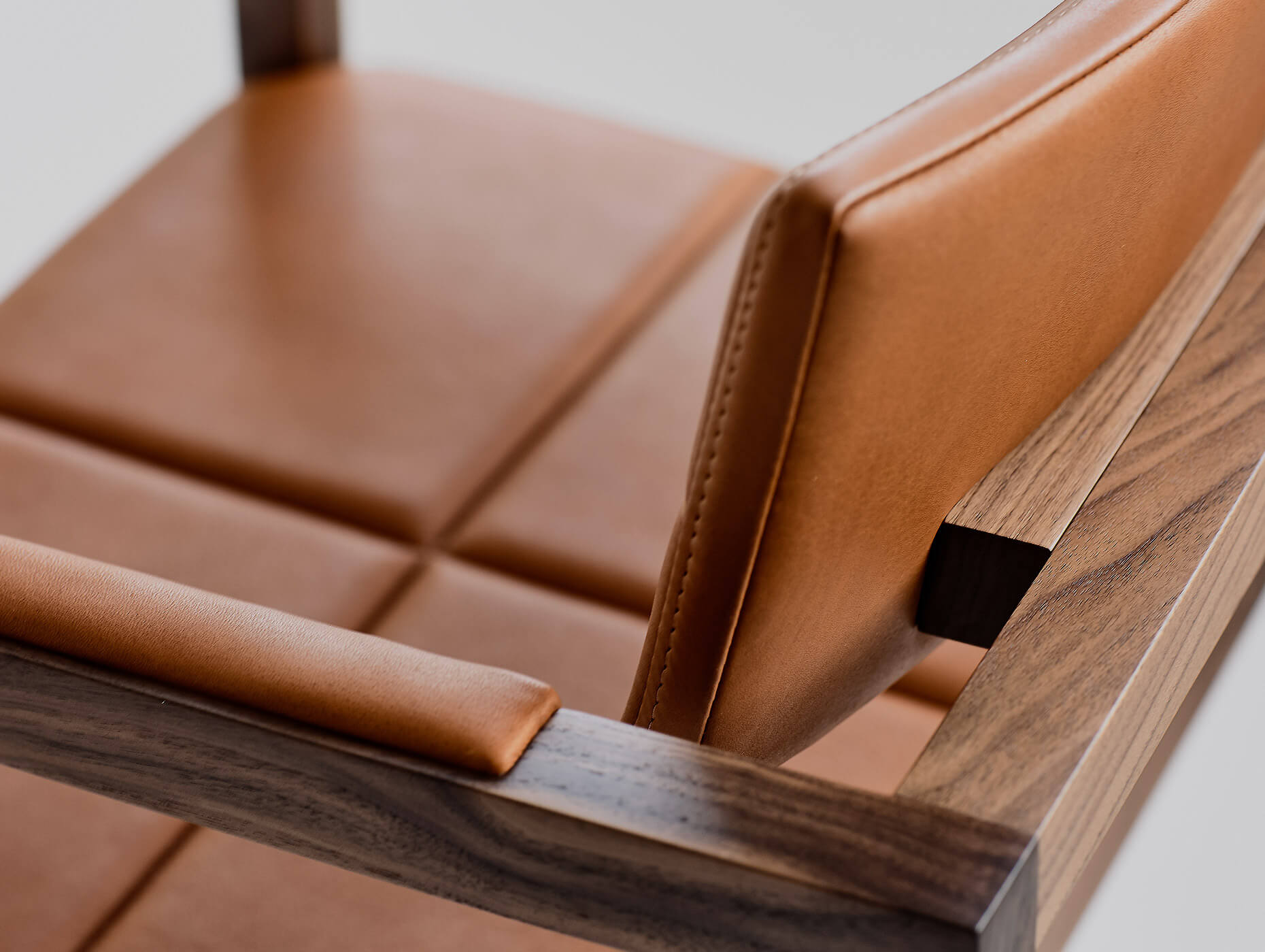 high end furniture Mila luxury armchair in tan leather and solid walnut wood