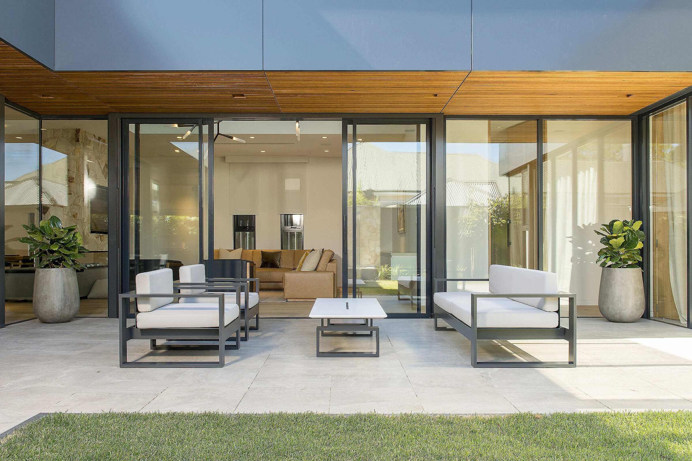 Nestled in the patio of this sensational architectural home is Australian Designer FrancoCrea's outdoor furniture to relax and enjoy balmy summer nights